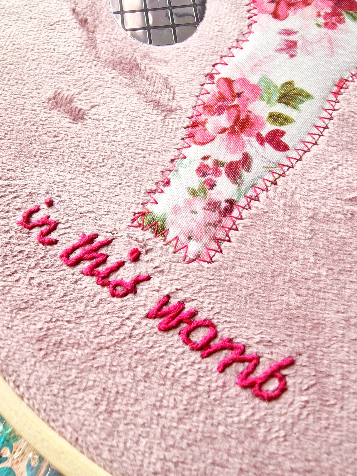 Pink floral womb with disco ball ovaries - Mixed media embroidery by Kerry in Herefordshire