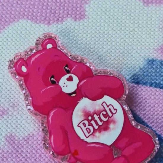 Close-up of swear bear design on pink needle minder - Strong magnet embroidery tool