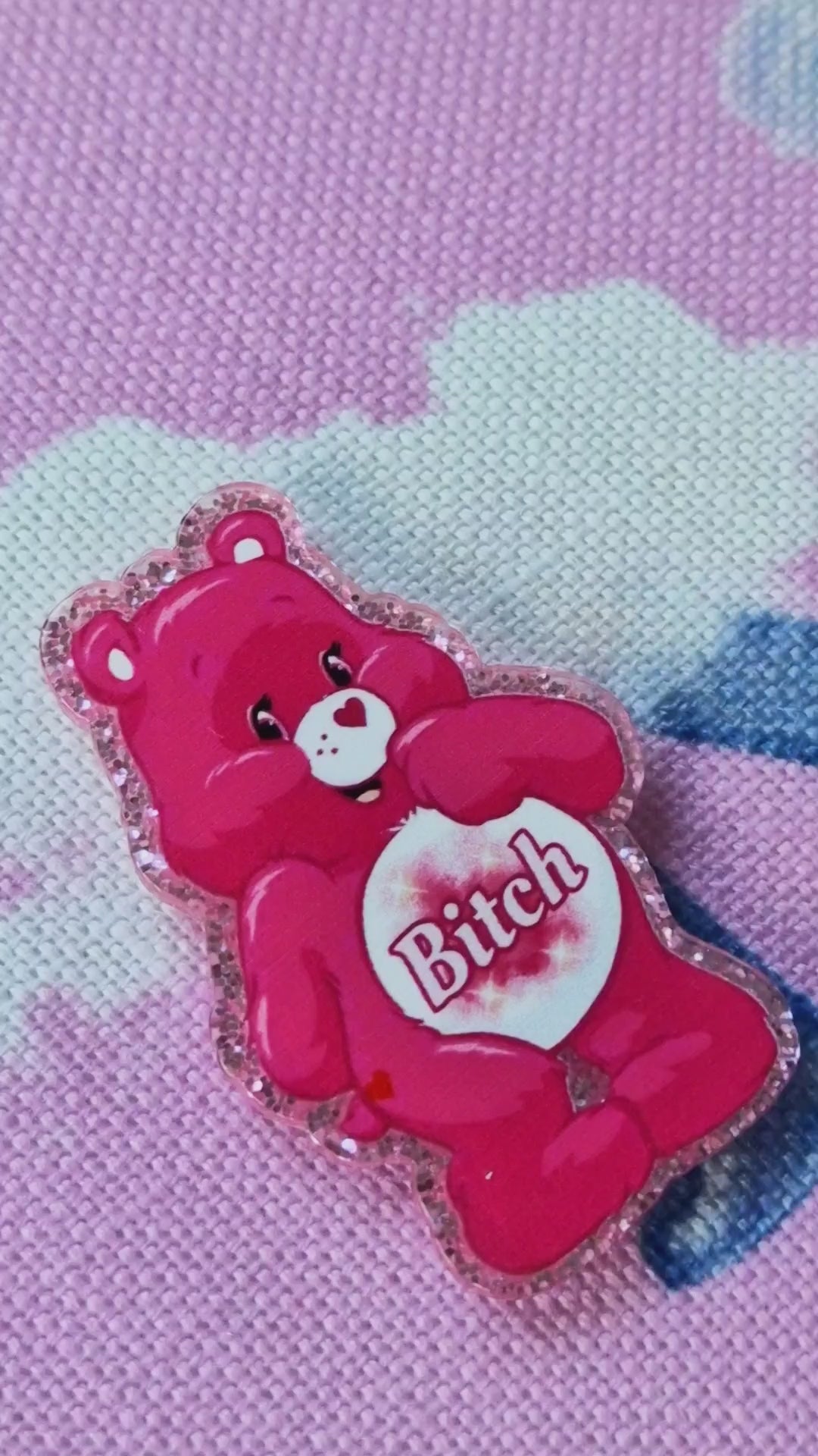 Close-up of swear bear design on pink needle minder - Strong magnet embroidery tool
