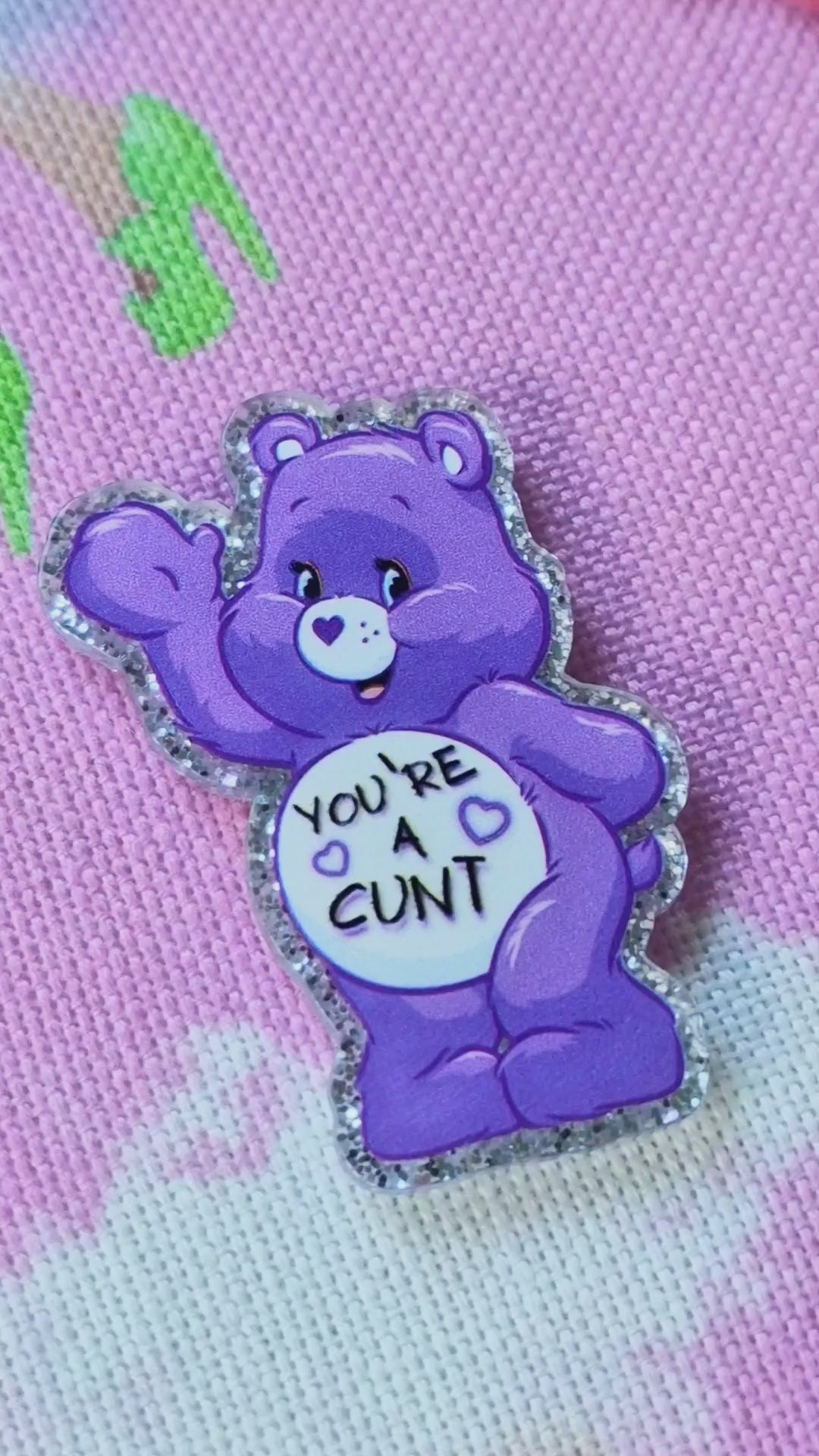 Close-up of swear bear design on purple needle minder - Strong magnet embroidery tool