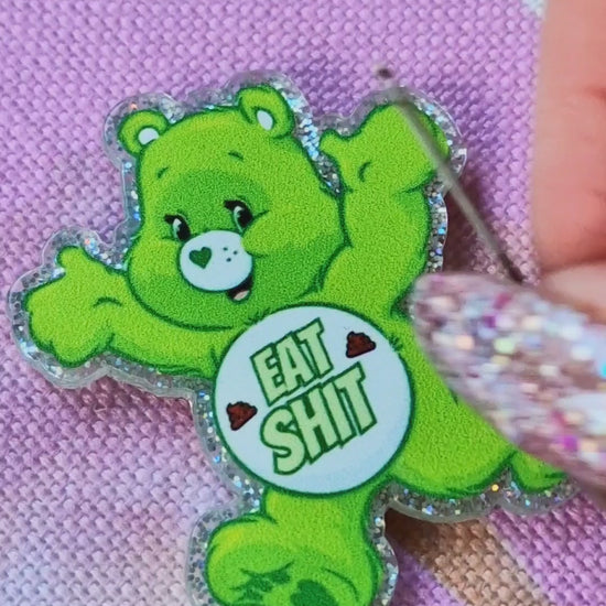 Close-up of swear bear design on green needle minder - Strong magnet embroidery tool